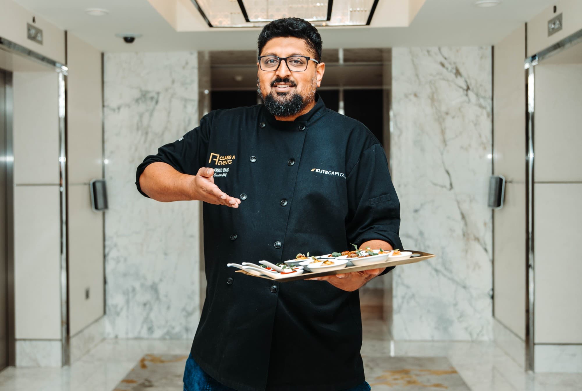 Chef preparing Hyderabadi biryani in the kitchen